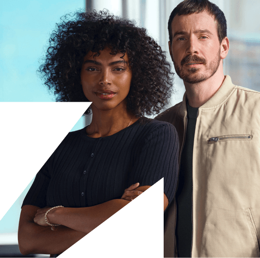 A woman and a man pose for the camera